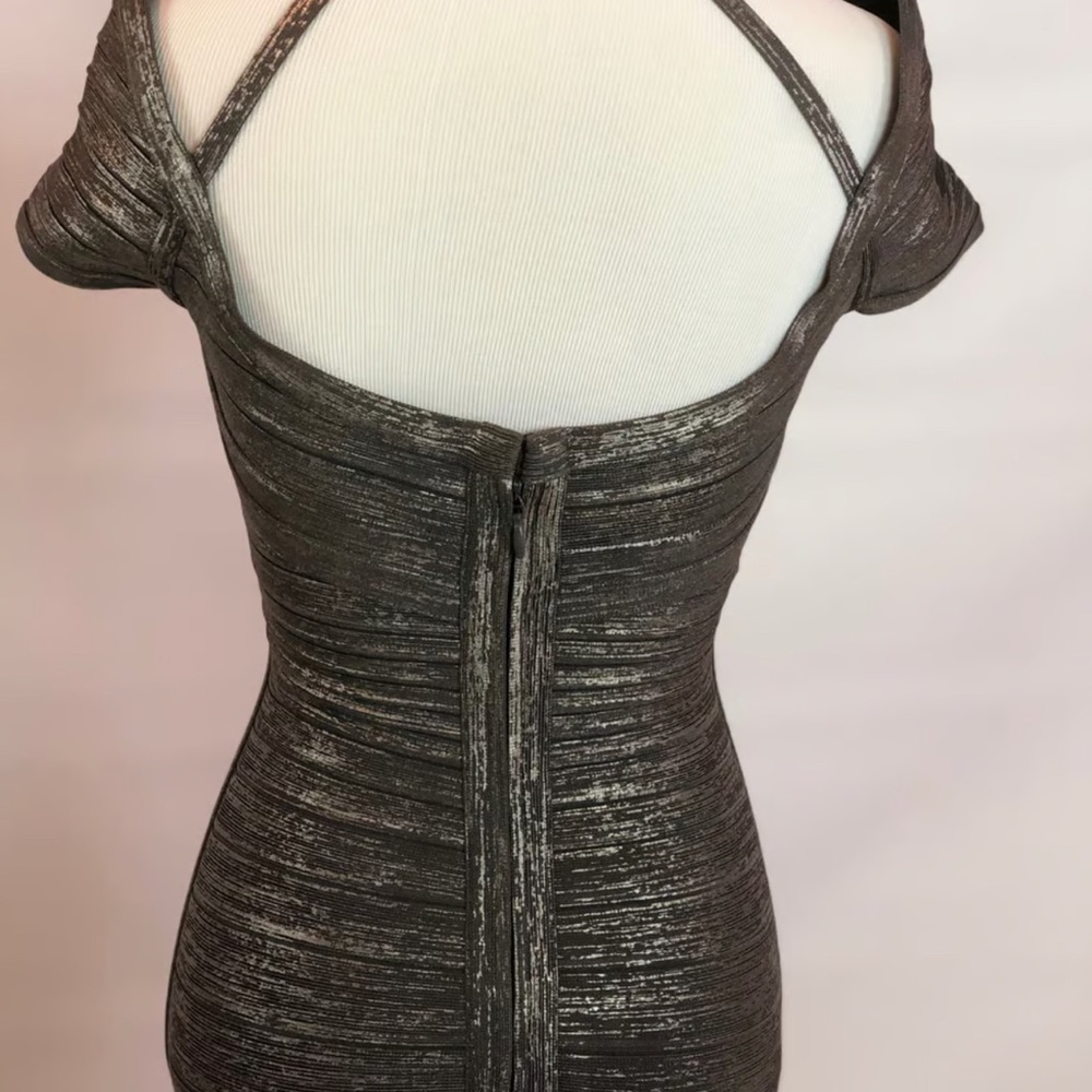 Only worn once. Bandage dress. Back zip. Unlined. Beautiful fit.